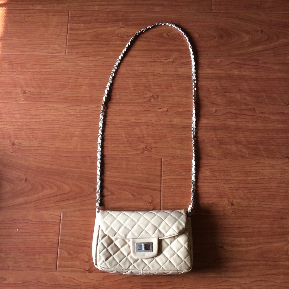 Chained cream bag